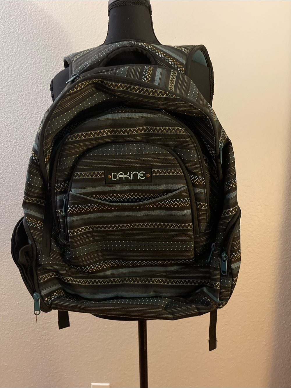 Dakine Black Striped Pattern Backpack with Teal Accents